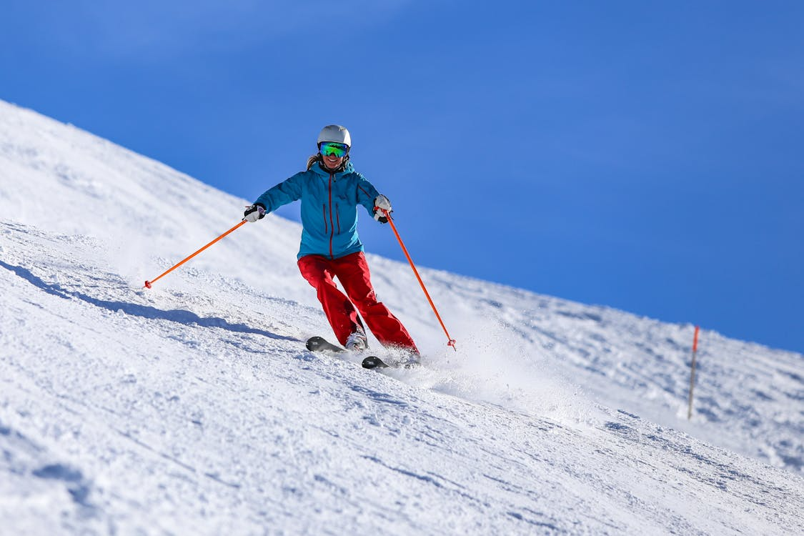 Spring skiing during shoulder season with clear skies and soft snow