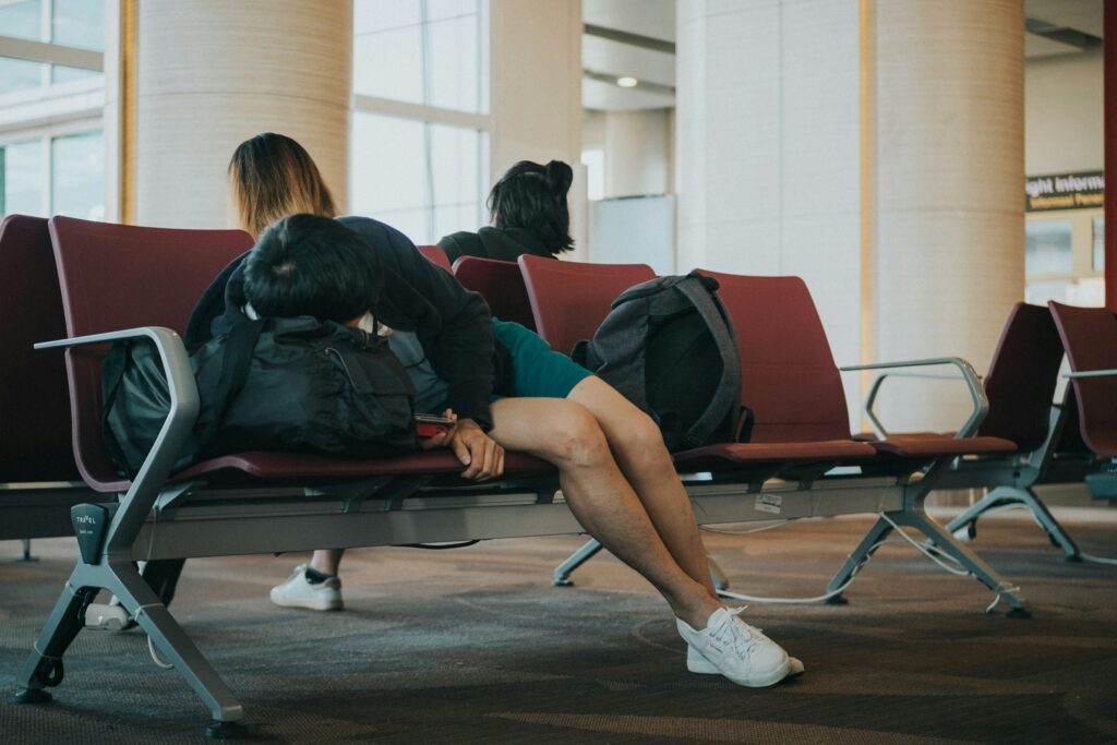 person lying on bench, Unsplash