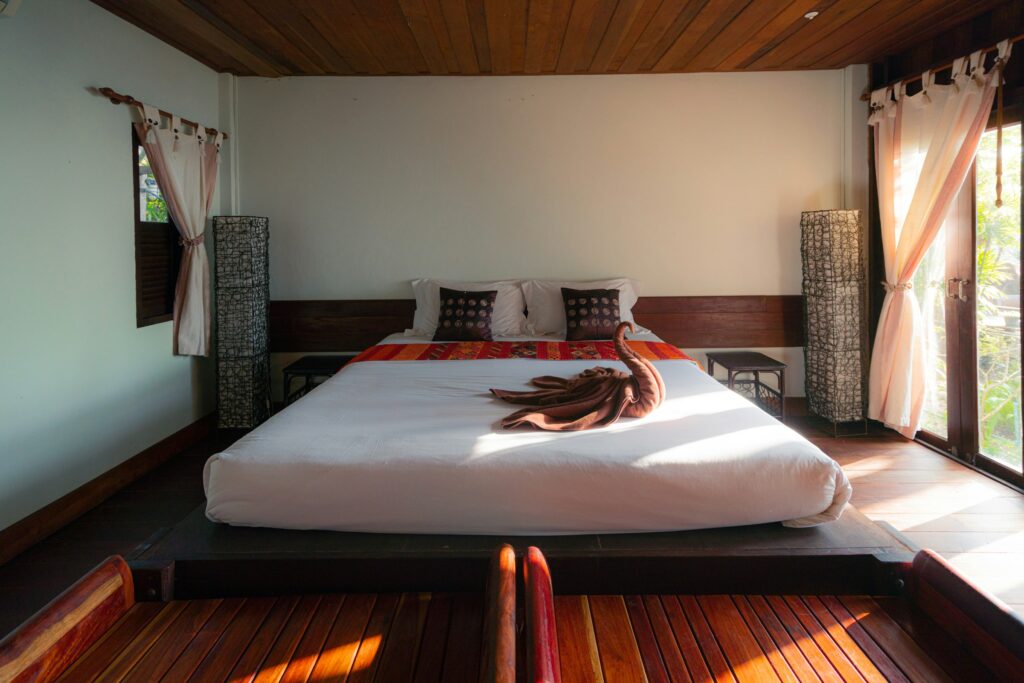 white linen on bed, Unsplash