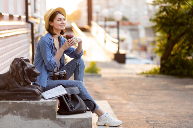 Traveler enjoying slow travel benefits with a quiet coffee break in the city.