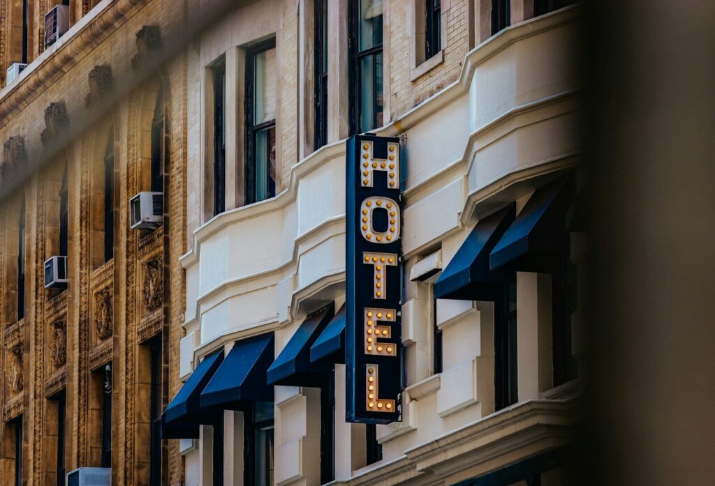A hotel sign on the side of a building