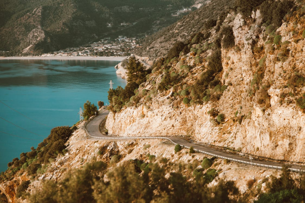 Winding cliffside road on one of the most scenic coastal drives in the world.