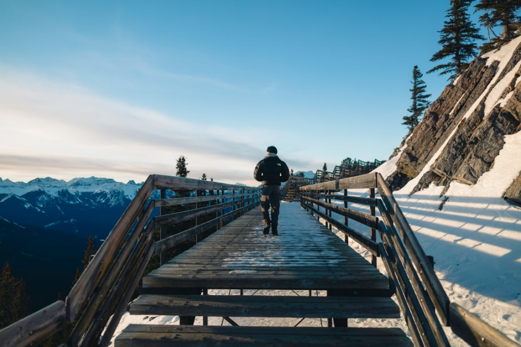 Traveler walking through Banff National Park, one of the best national parks in the world.